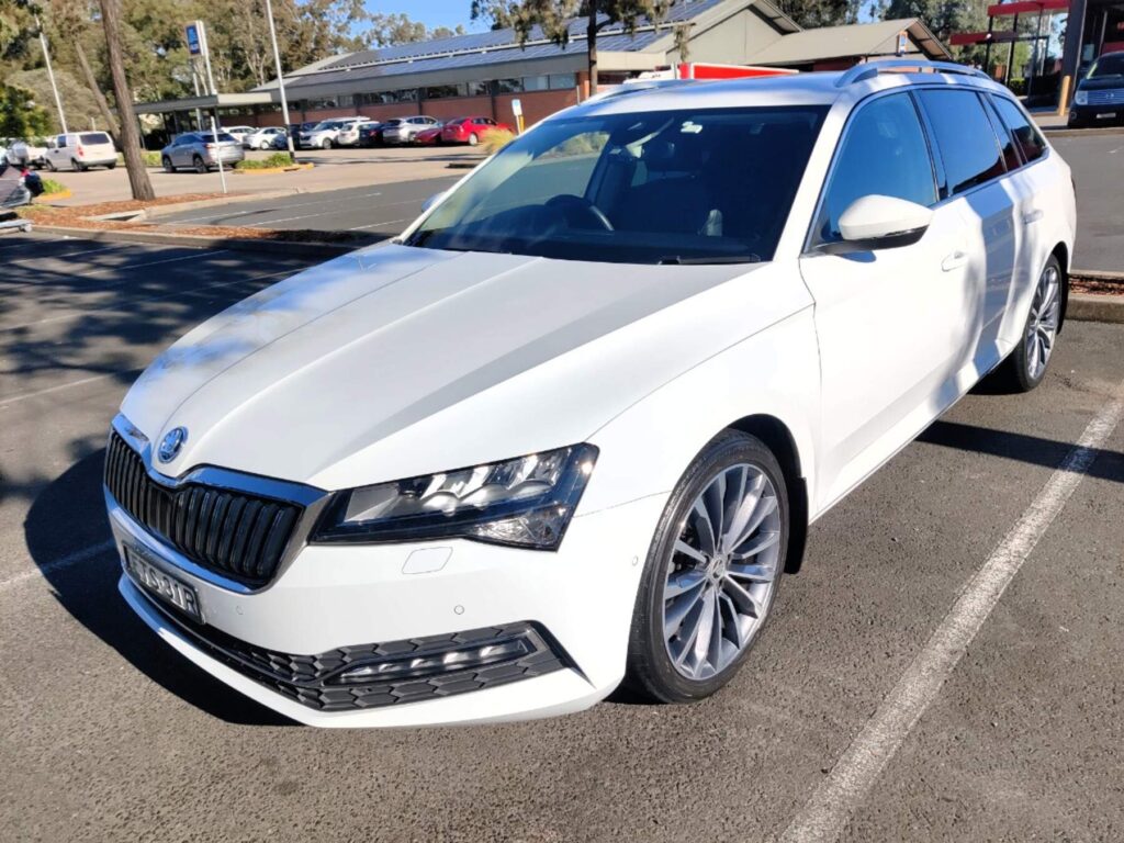 White sedan gloss exterior car wash near Kellyville at The Washouse